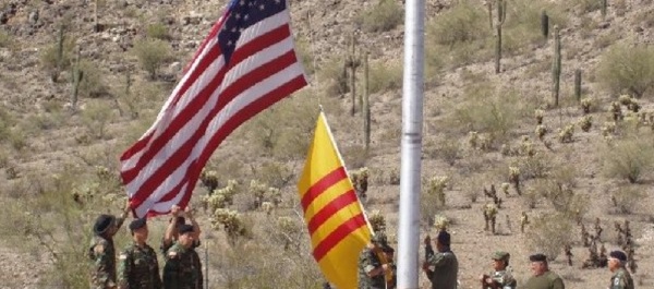 At Col. Joe Abodeely's Base Camp near Maricopa, Arizona, each year the flag of South Vietnam is raised along with the U.S. flag. 'We forget that we went to South Vietnam to help the Vietnamese people,' Abodeely says. Courtesy Base Camp Website.